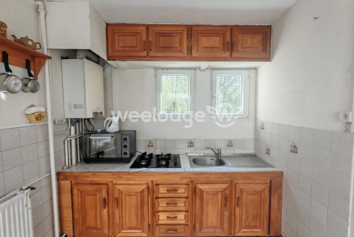 Maison à vendre à Maisnil-lès-Ruitz, 5 chambres, jardin, garage, proximité axes 