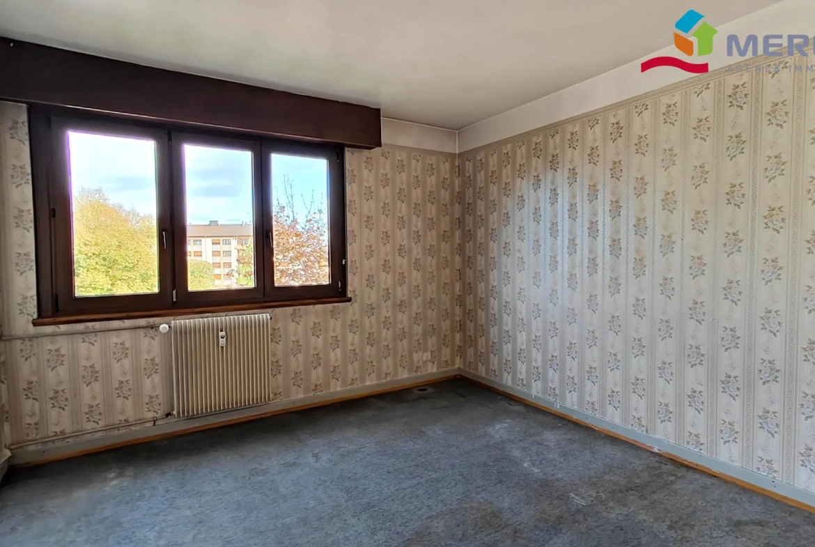 Chambre 2 Appartement à rénover de 95 m² à Ostwald – Opportunité à saisir 