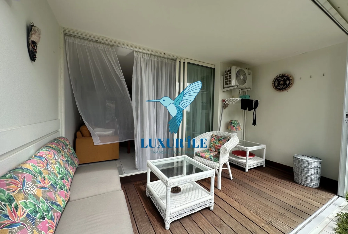 Grand studio en rez-de-jardin avec piscine à Saint-Martin, proche plage de la Baie Orientale 