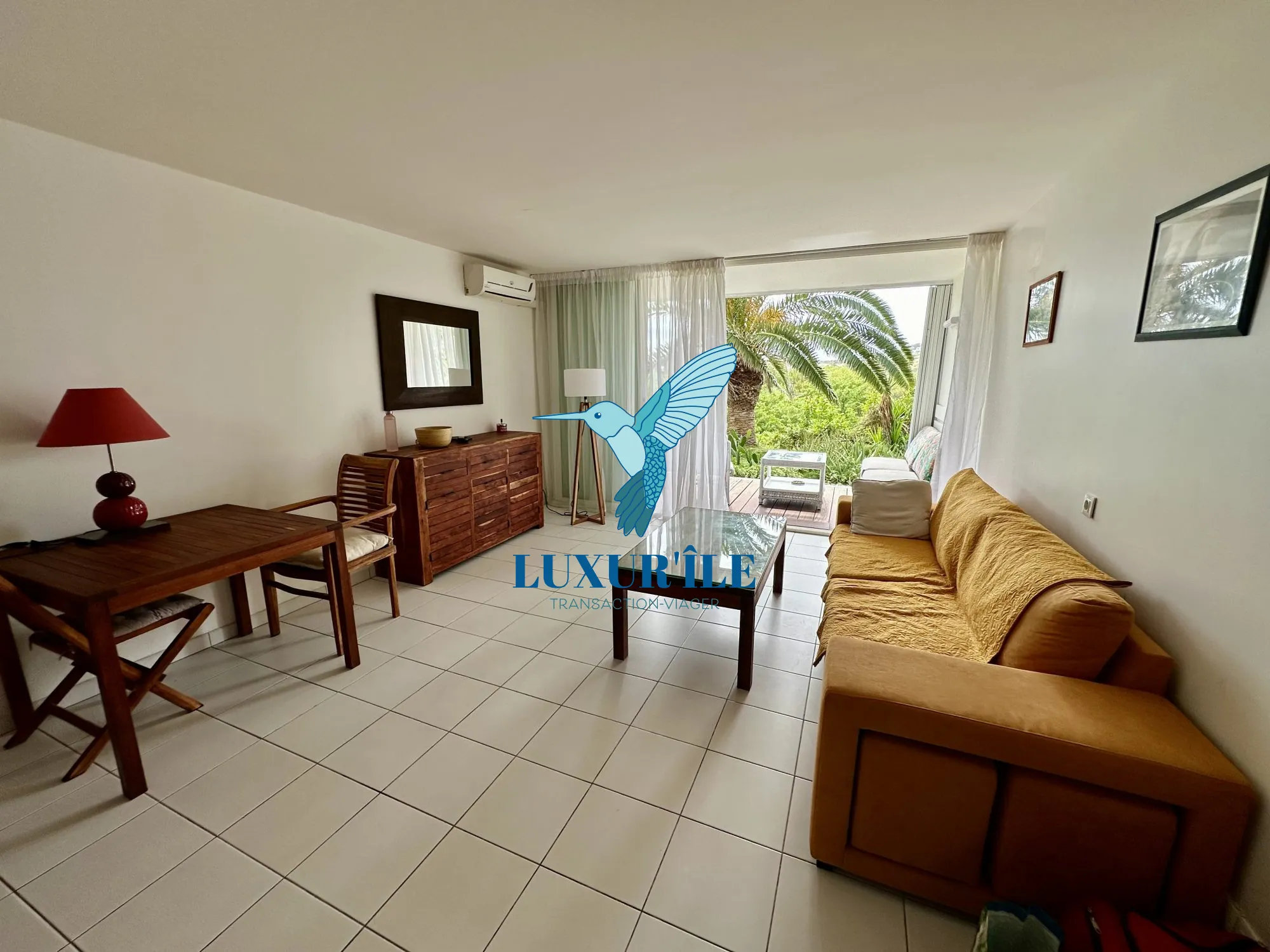 Grand studio en rez-de-jardin avec piscine à Saint-Martin, proche plage de la Baie Orientale 