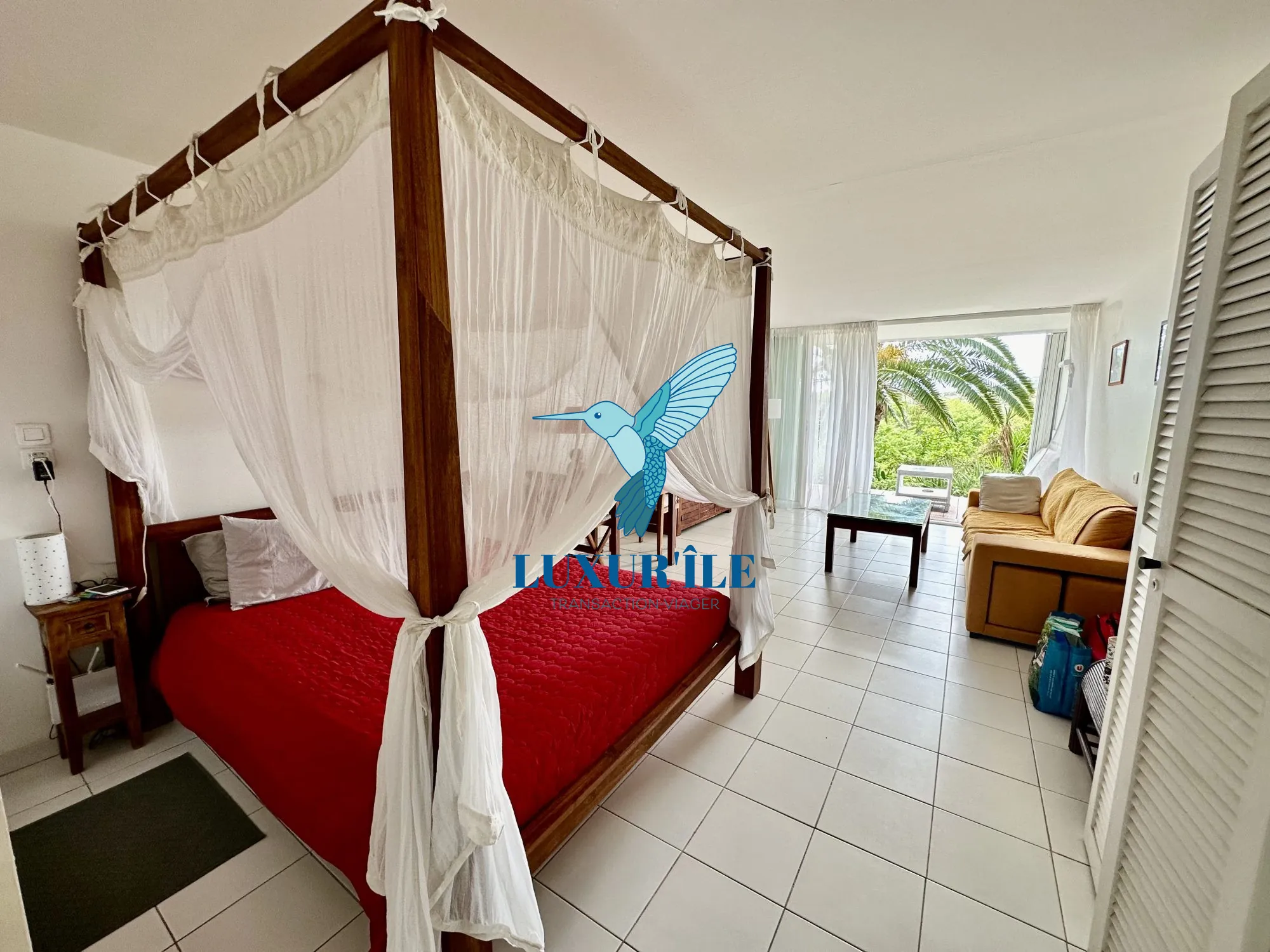 Grand studio en rez-de-jardin avec piscine à Saint-Martin, proche plage de la Baie Orientale 