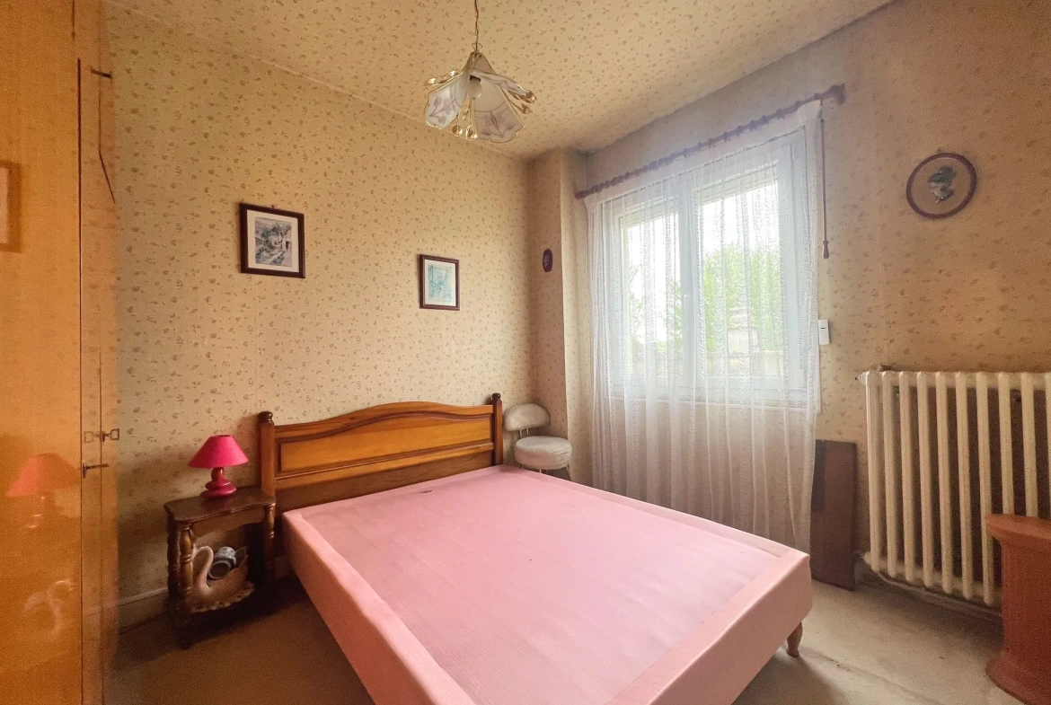 Maison à vendre à Saint-Marcel avec jardin, garage et cave 