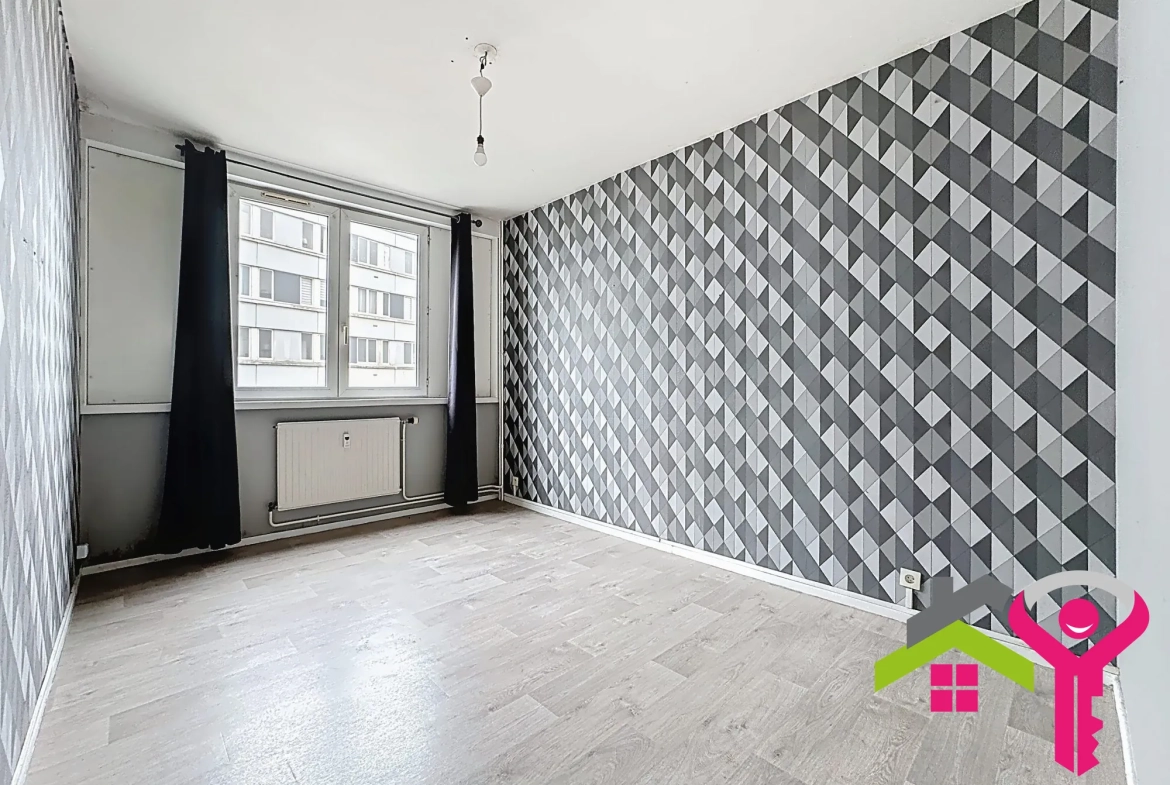 Appartement T3 lumineux avec cave et garage à Raismes - 66,50 m² 