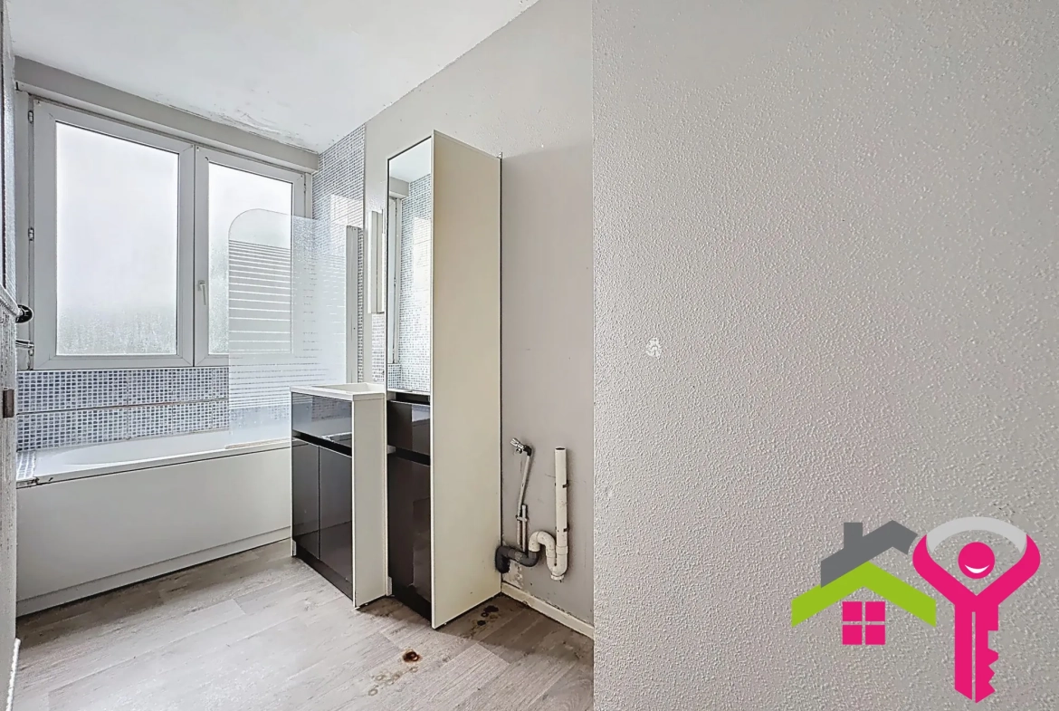 Appartement T3 lumineux avec cave et garage à Raismes - 66,50 m² 