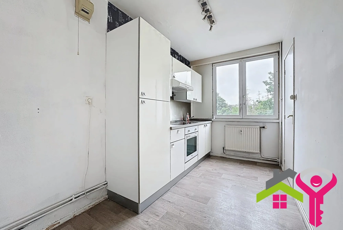 Appartement T3 lumineux avec cave et garage à Raismes - 66,50 m² 