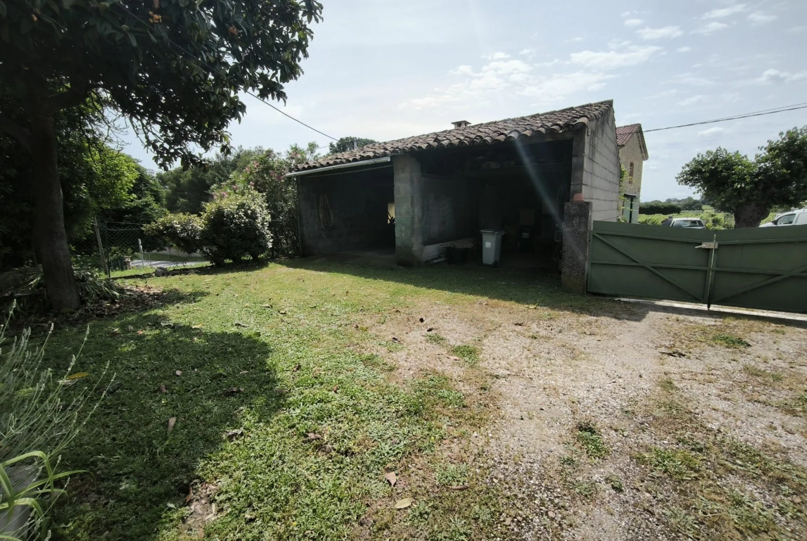 Belle maison en pierre de 86 m² avec jardin et dépendances à Saint-Christol-lès-Alès 