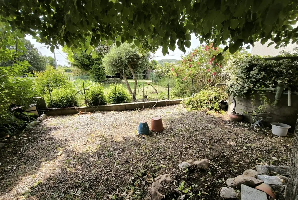 Belle maison en pierre de 86 m² avec jardin et dépendances à Saint-Christol-lès-Alès 