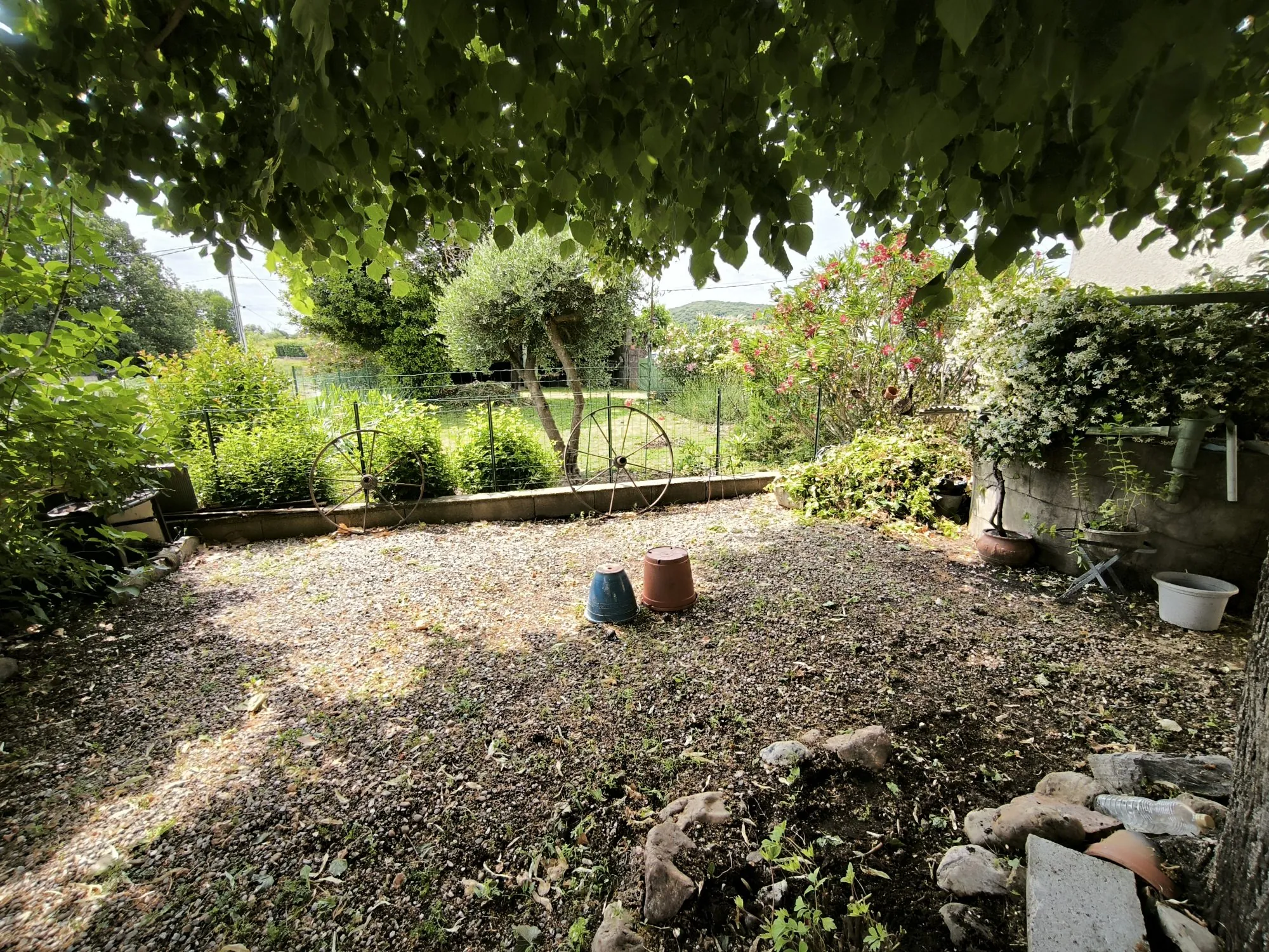 Belle maison en pierre de 86 m² avec jardin et dépendances à Saint-Christol-lès-Alès 