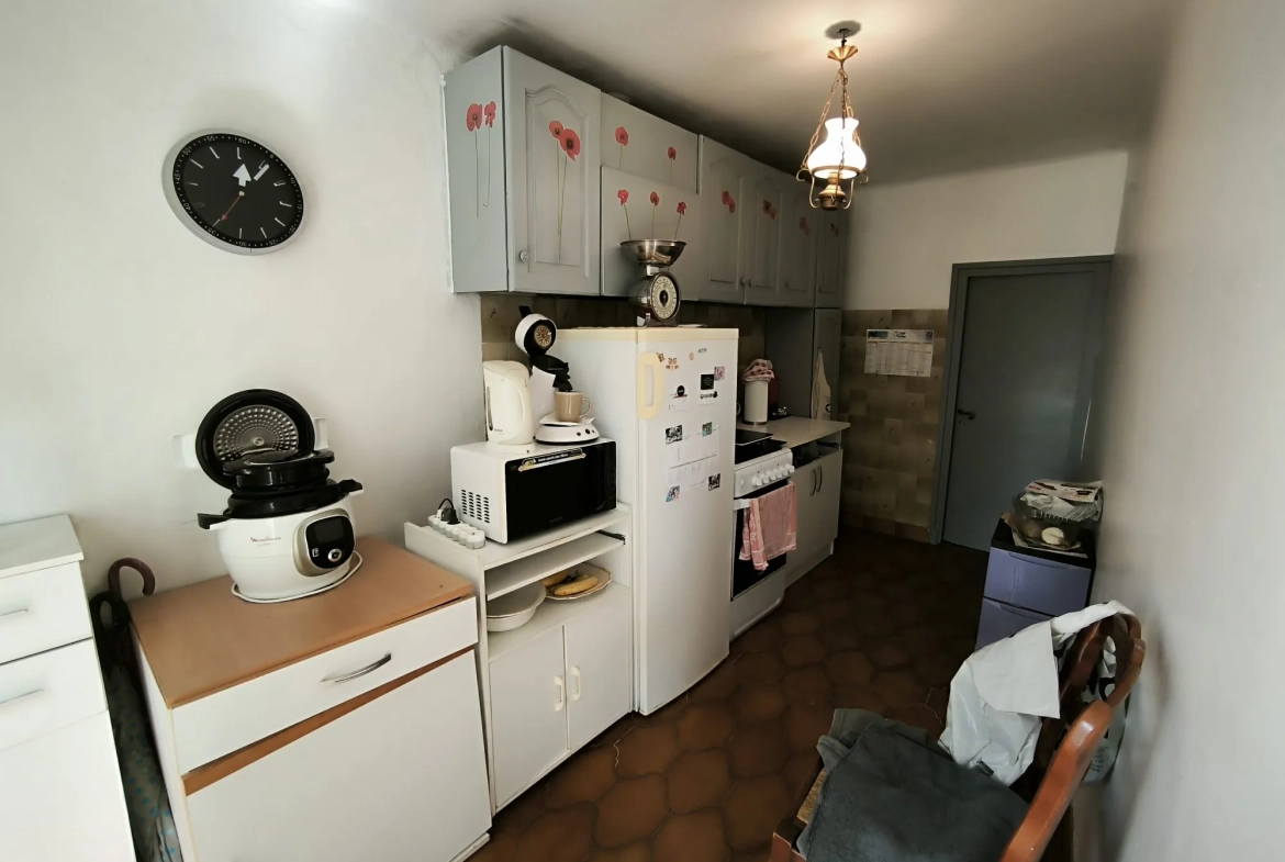Belle maison en pierre de 86 m² avec jardin et dépendances à Saint-Christol-lès-Alès 
