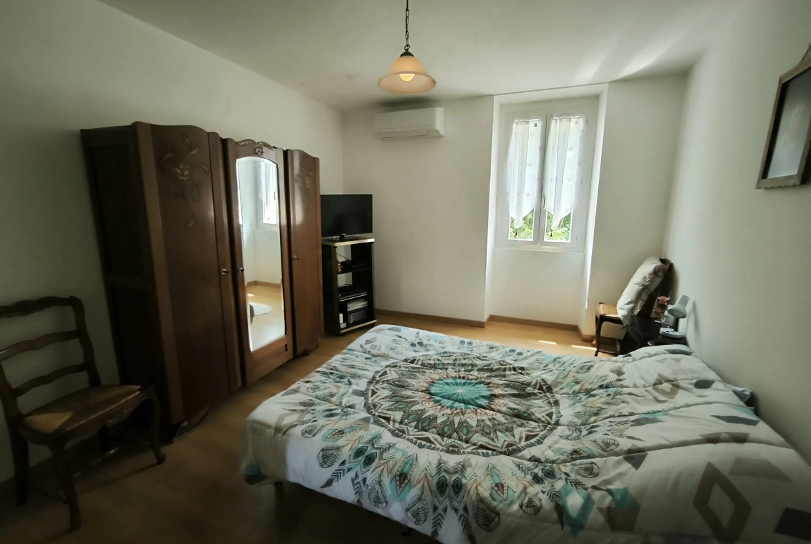 Belle maison en pierre de 86 m² avec jardin et dépendances à Saint-Christol-lès-Alès 