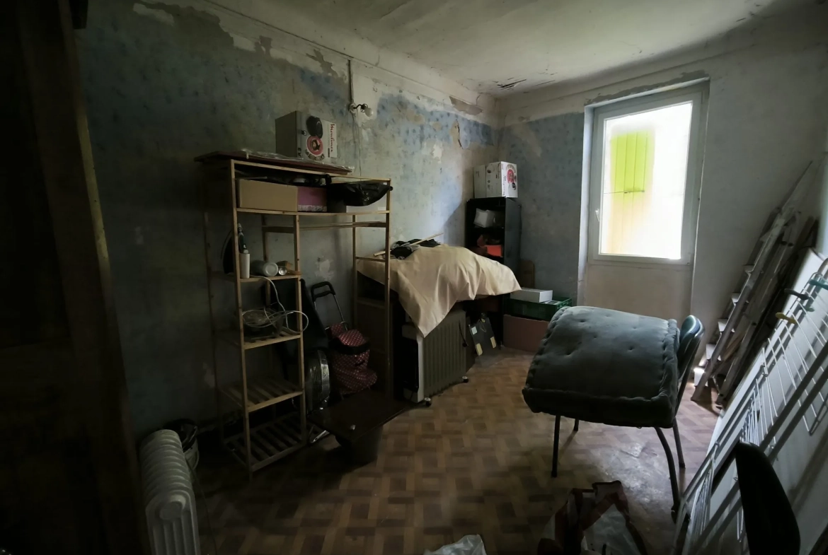 Belle maison en pierre de 86 m² avec jardin et dépendances à Saint-Christol-lès-Alès 