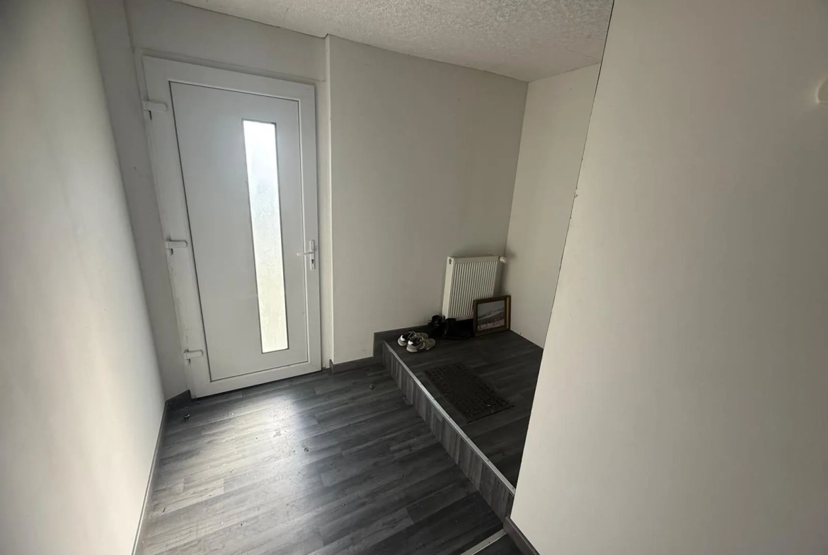Maison mitoyenne à vendre à Bavans – 111 m², 2 appartements, terrain 12 ares 
