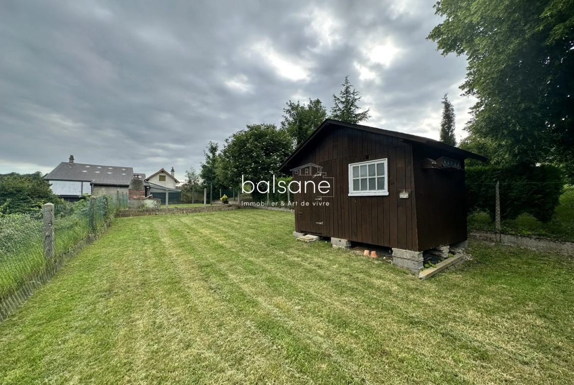 Maison de ville à Elbeuf avec vue panoramique et potentiel de rénovation 