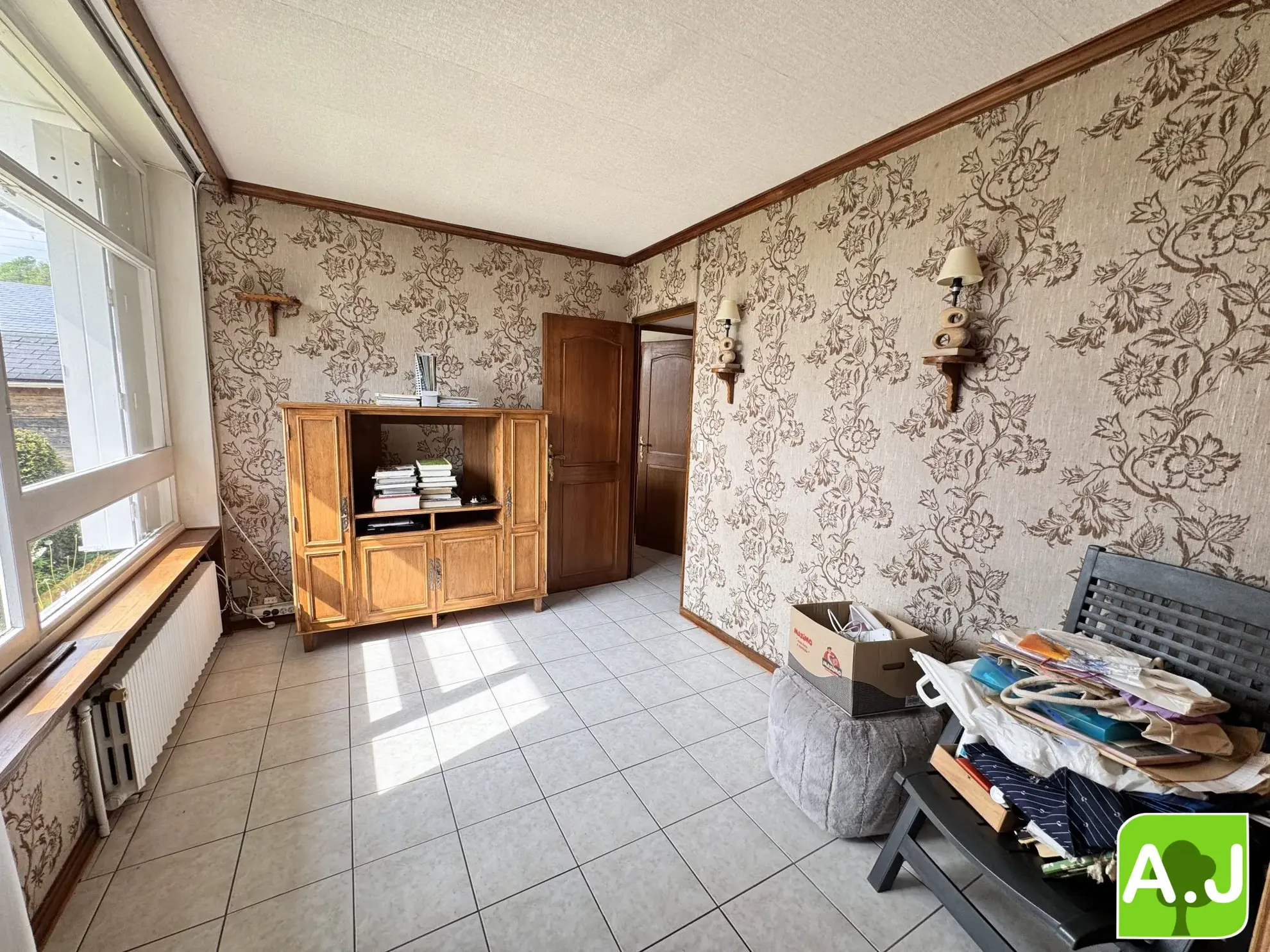 Maison plain-pied 2 chambres à Ézy-sur-Eure – 84 m², garage et terrain clos 