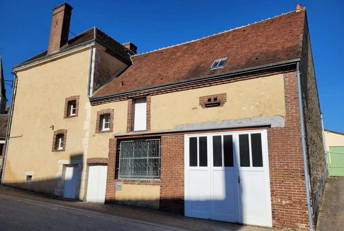 Charmante maison de village avec jardin, garage et potentiel d'aménagement 