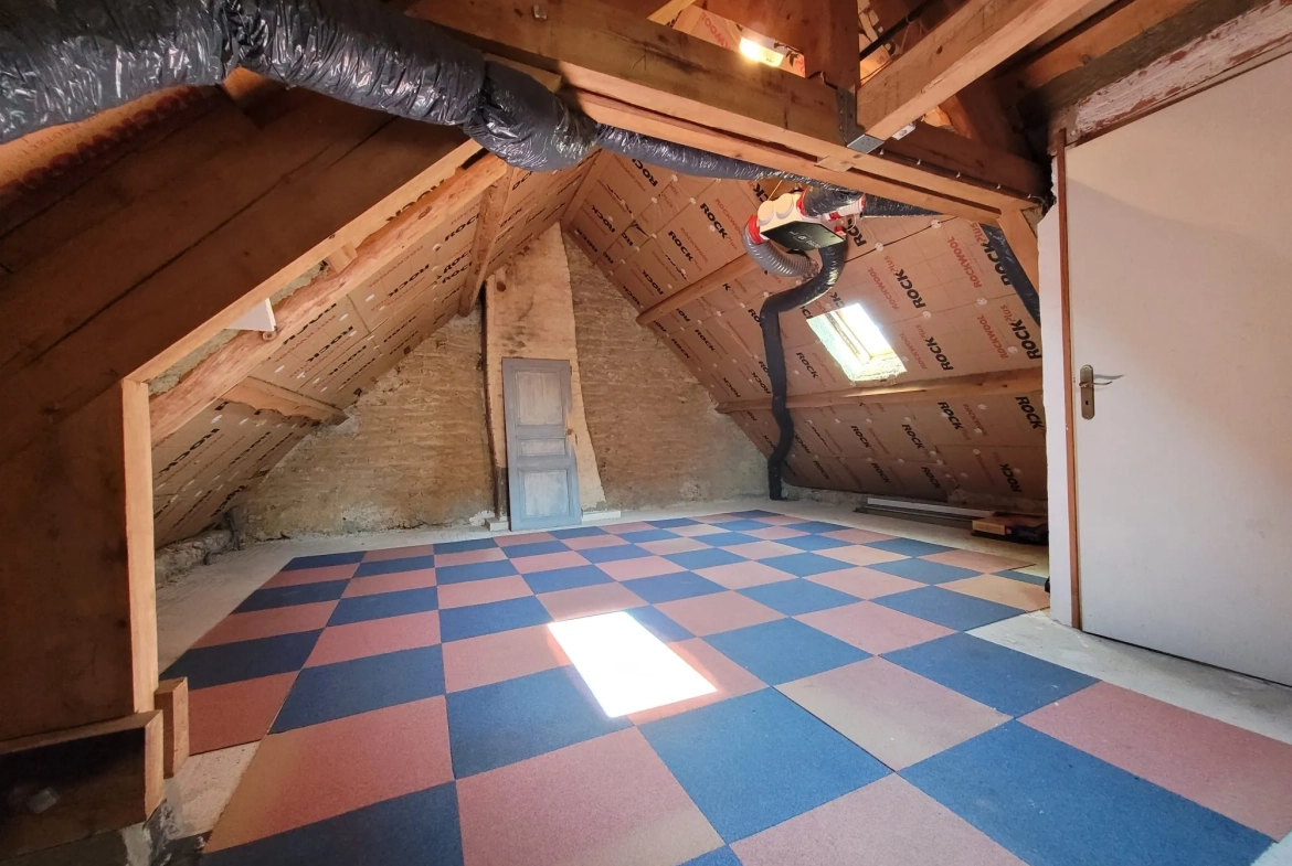 Charmante maison de village avec jardin, garage et potentiel d'aménagement 