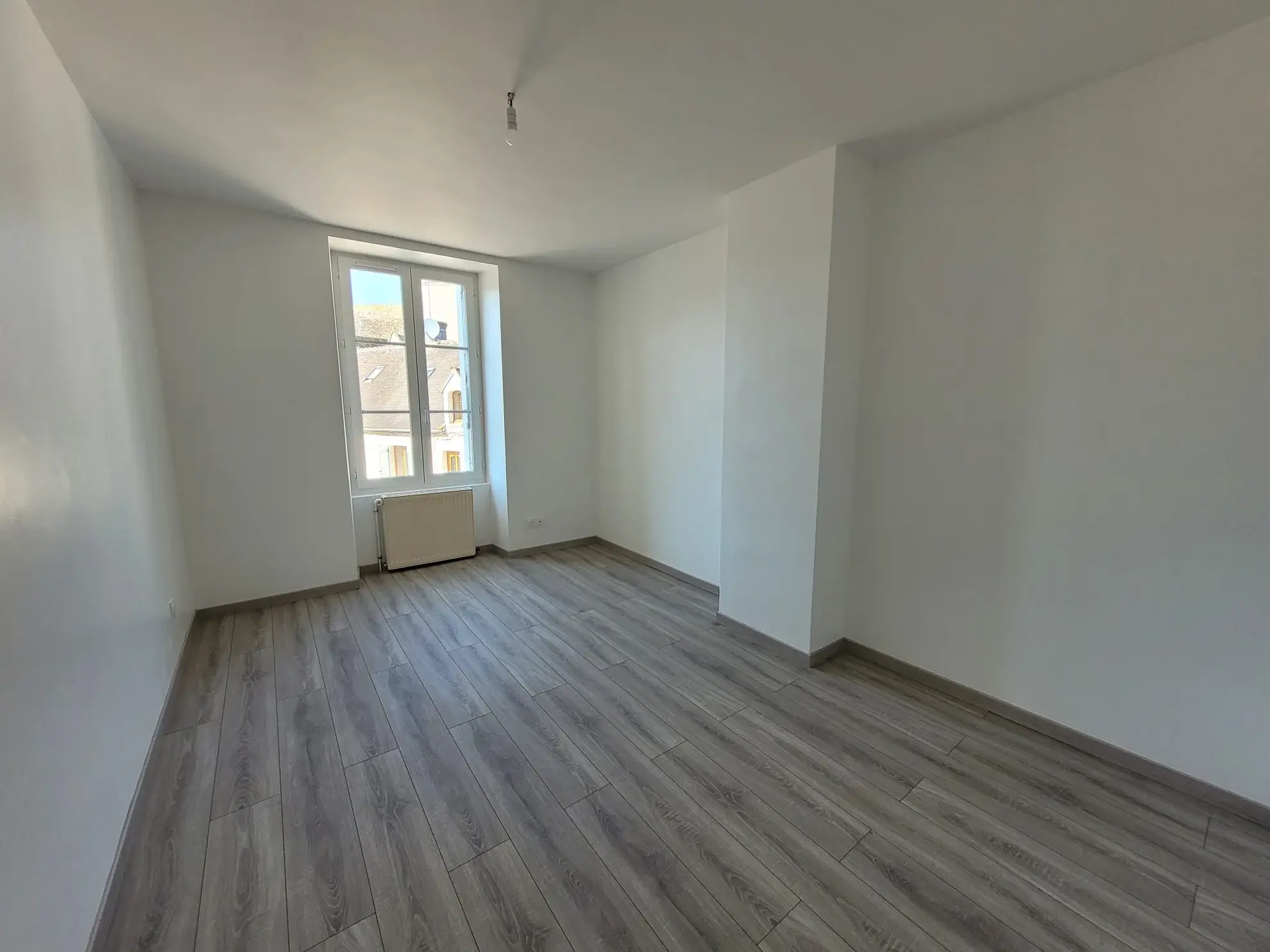 Charmante maison de village avec jardin, garage et potentiel d'aménagement 