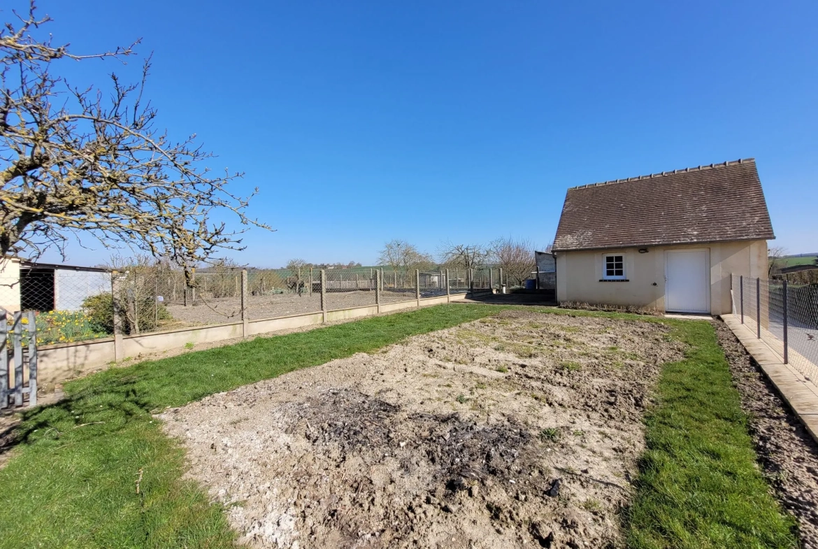 Charmante maison de village avec jardin, garage et potentiel d'aménagement 