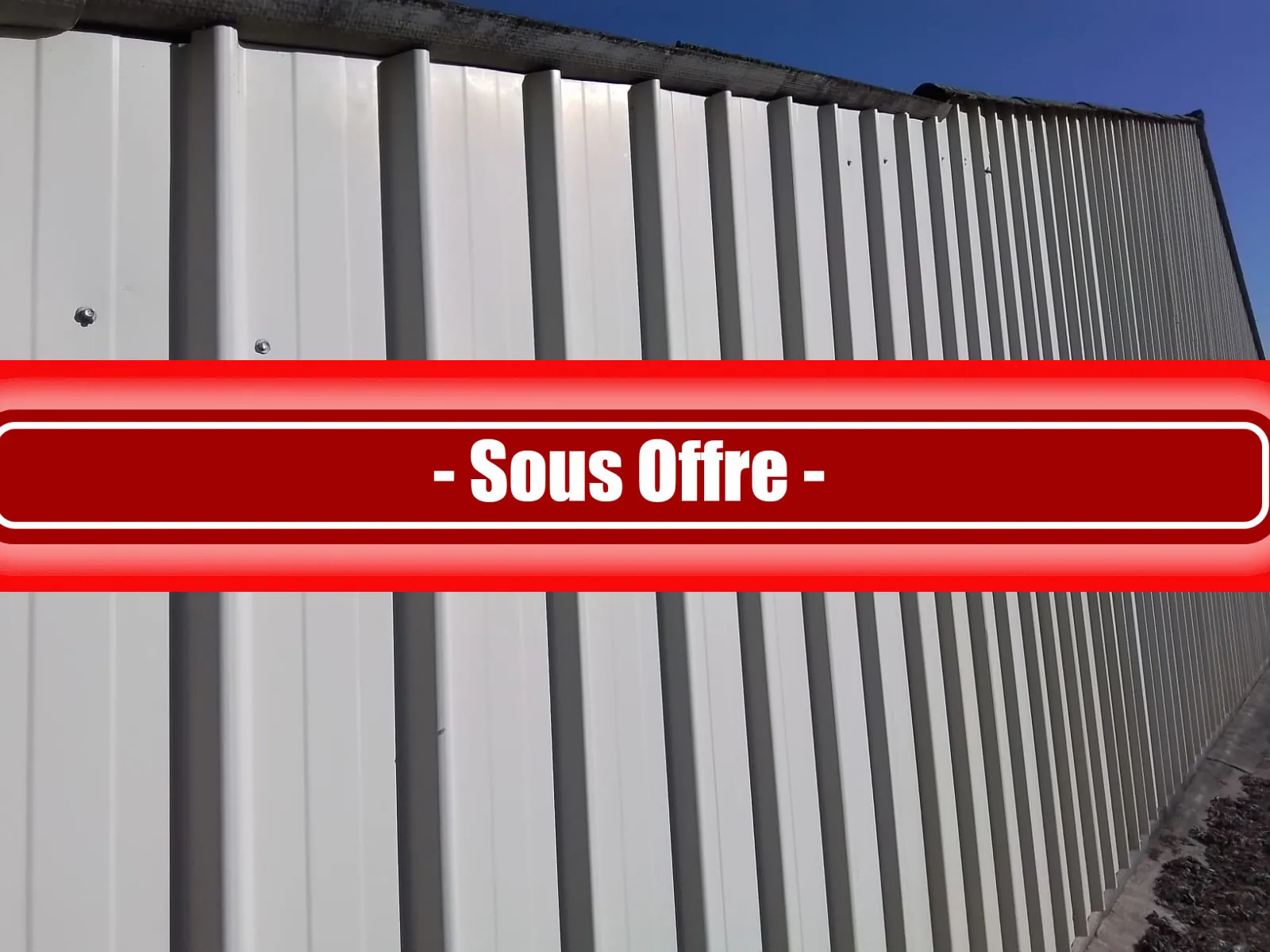 À vendre entrepôt à Joyeuse avec potentiel d'aménagement et grand parking - Opportunité rare 