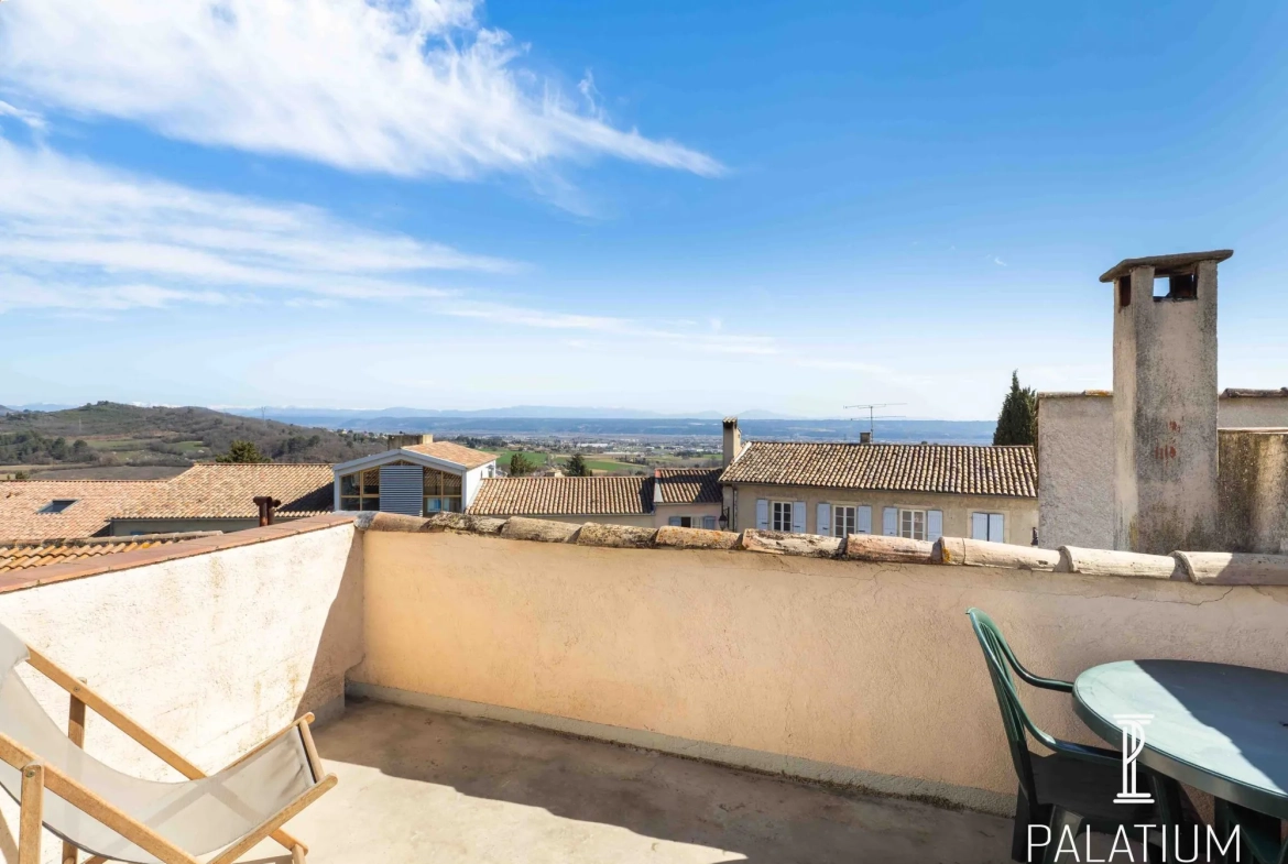 Maison de village rénovée à Pierrevert avec terrasse et cave, vue dégagée 