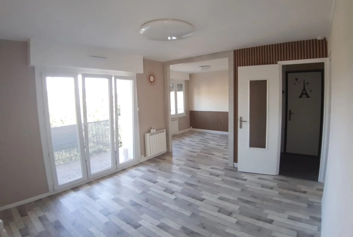 Appartement T4 à Saint-Dié-des-Vosges avec vue imprenable, garage et cave 