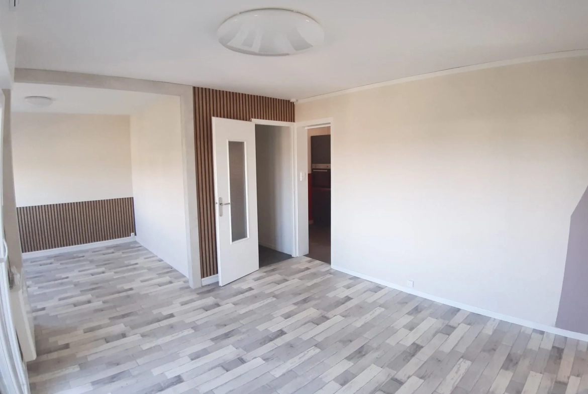 Appartement T4 à Saint-Dié-des-Vosges avec vue imprenable, garage et cave 