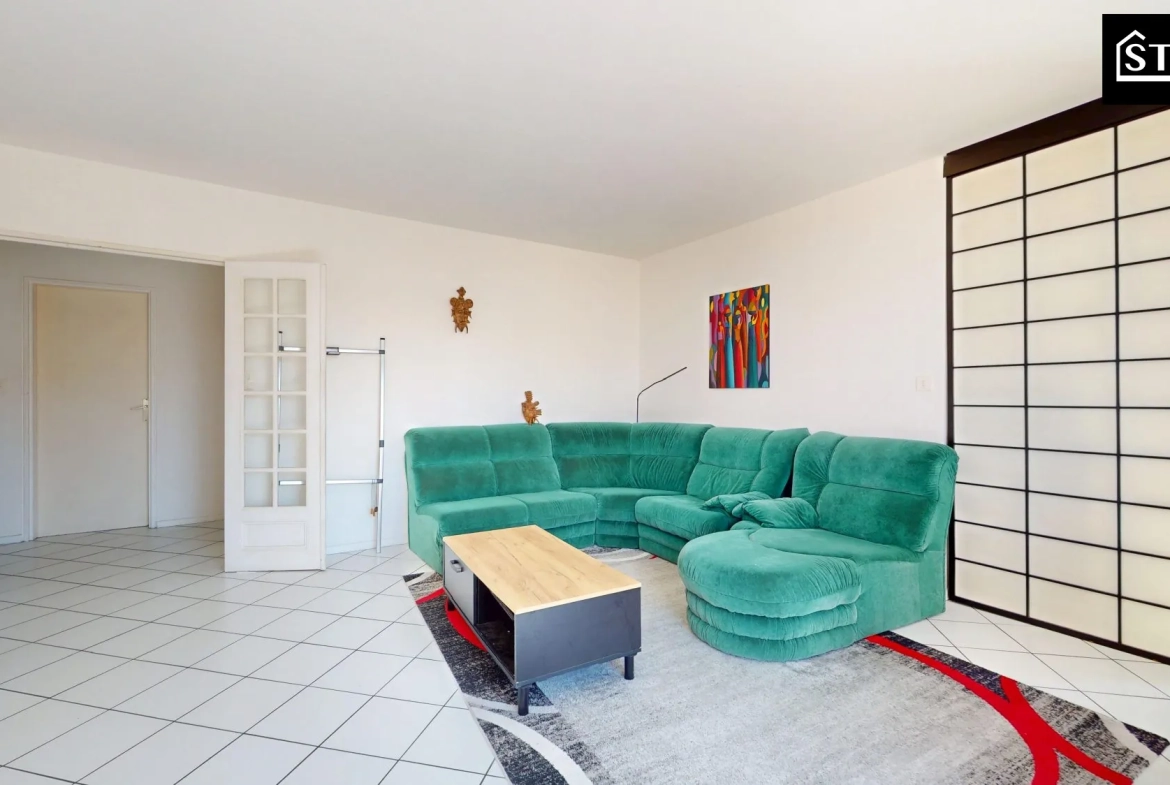 Appartement T4/T5 lumineux avec ascenseur, cave et parking au centre de Belfort 
