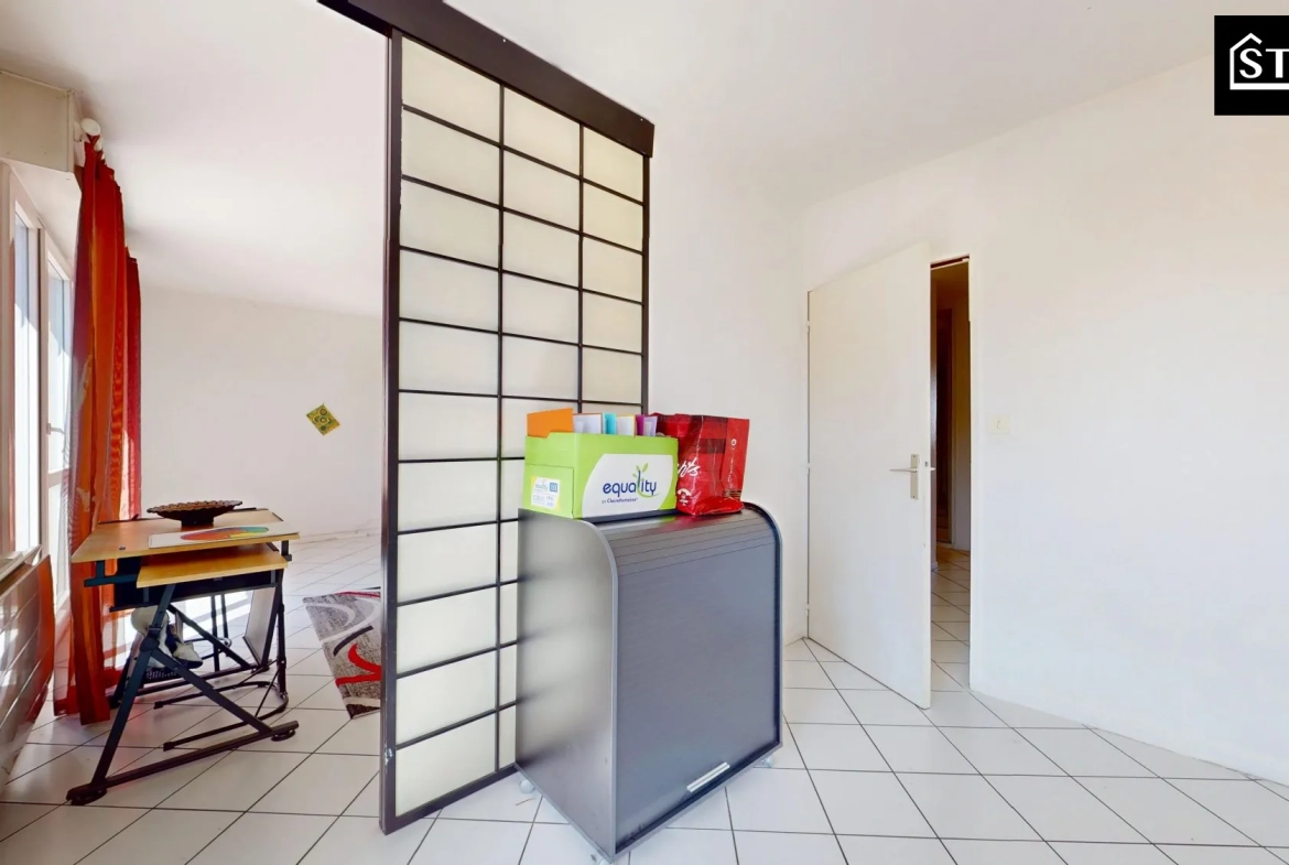 Appartement T4/T5 lumineux avec ascenseur, cave et parking au centre de Belfort 