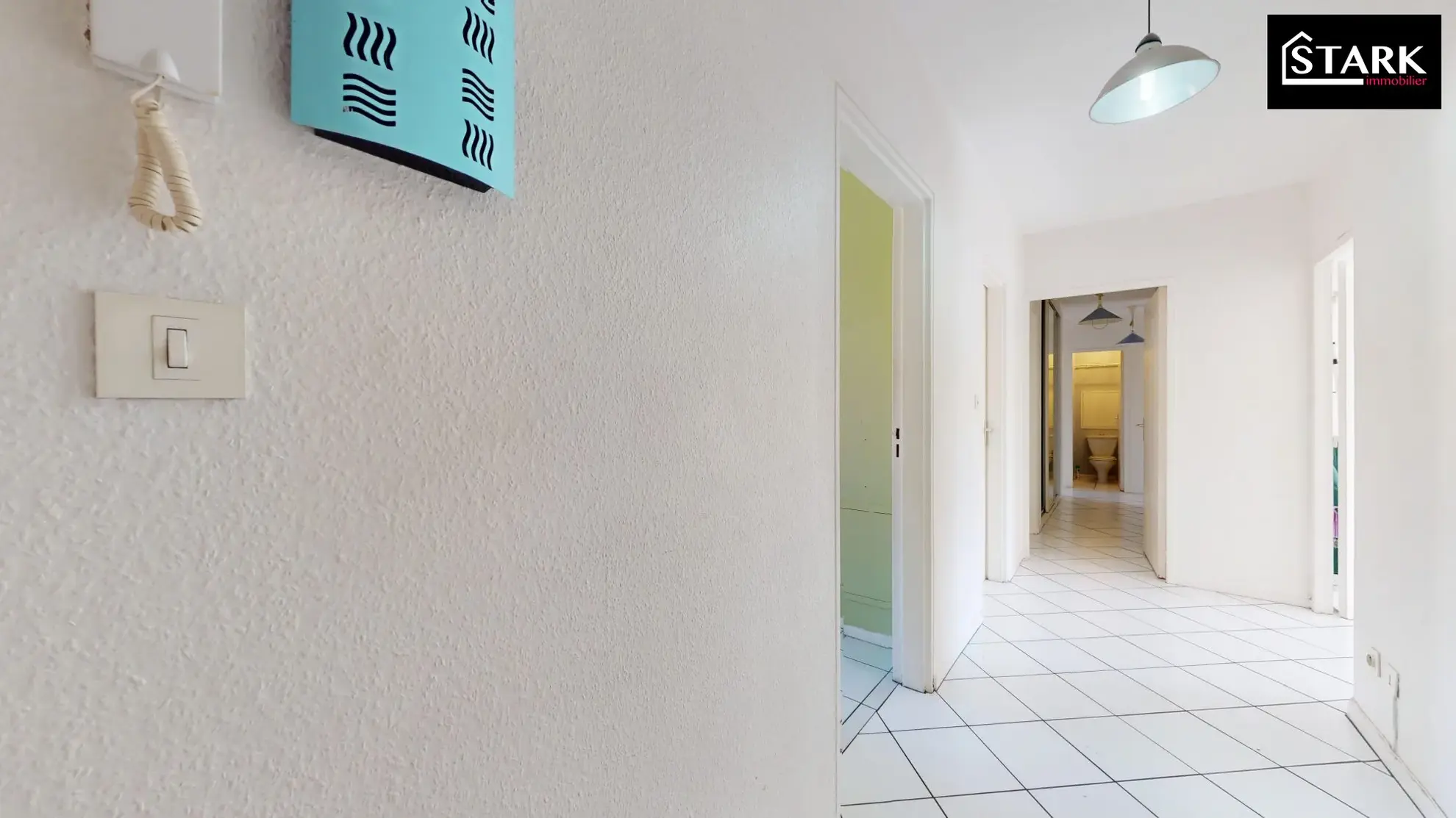 Appartement T4/T5 lumineux avec ascenseur, cave et parking au centre de Belfort 