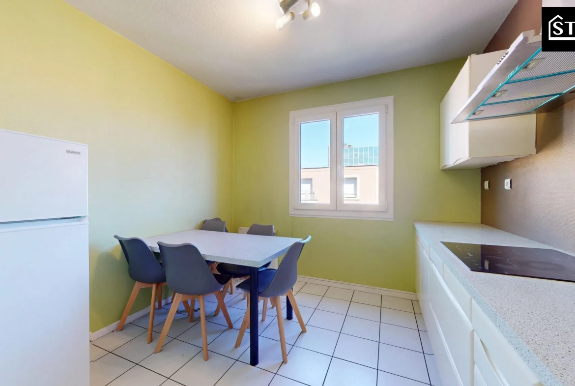 Appartement T4/T5 lumineux avec ascenseur, cave et parking au centre de Belfort 
