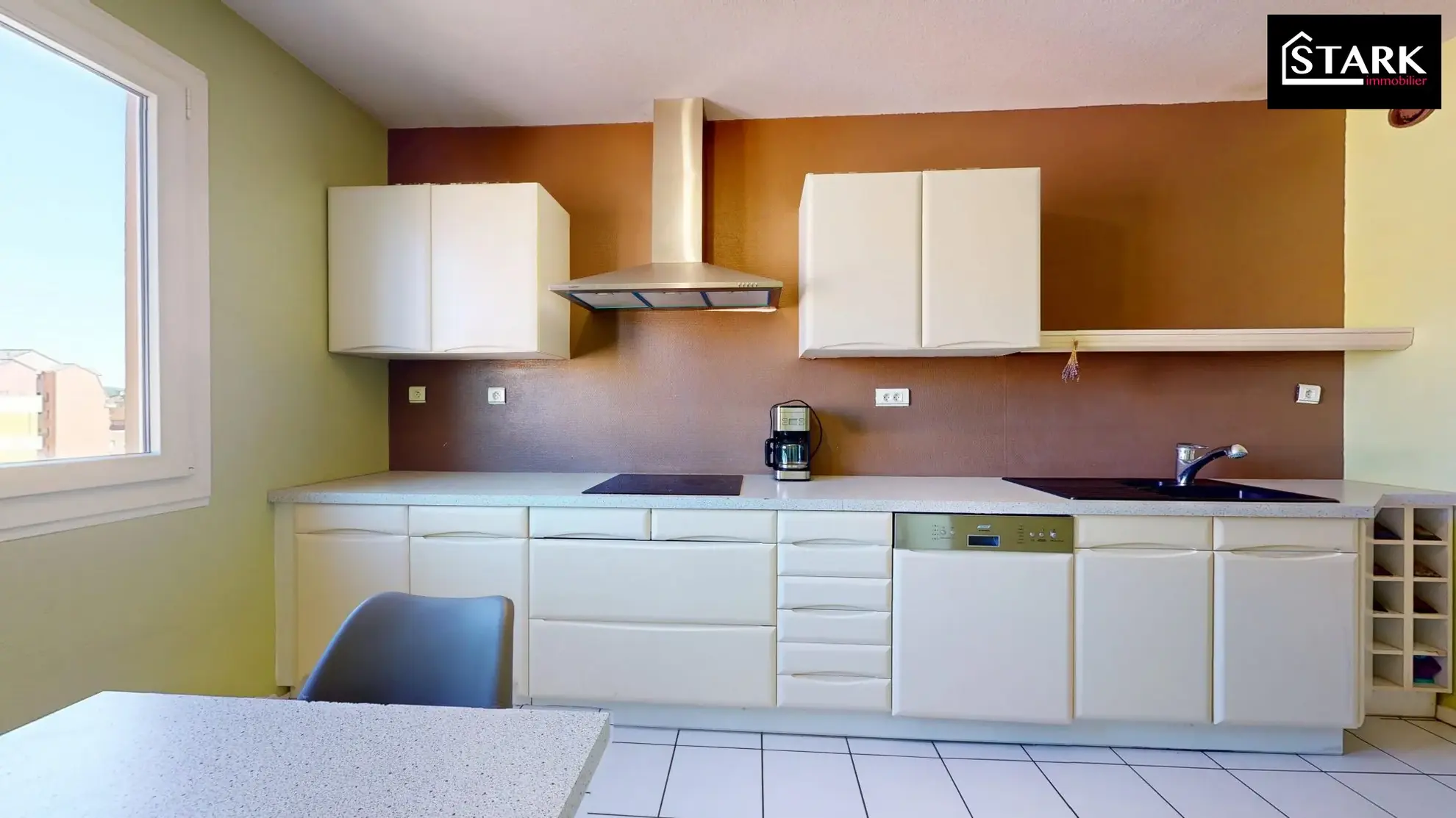 Appartement T4/T5 lumineux avec ascenseur, cave et parking au centre de Belfort 