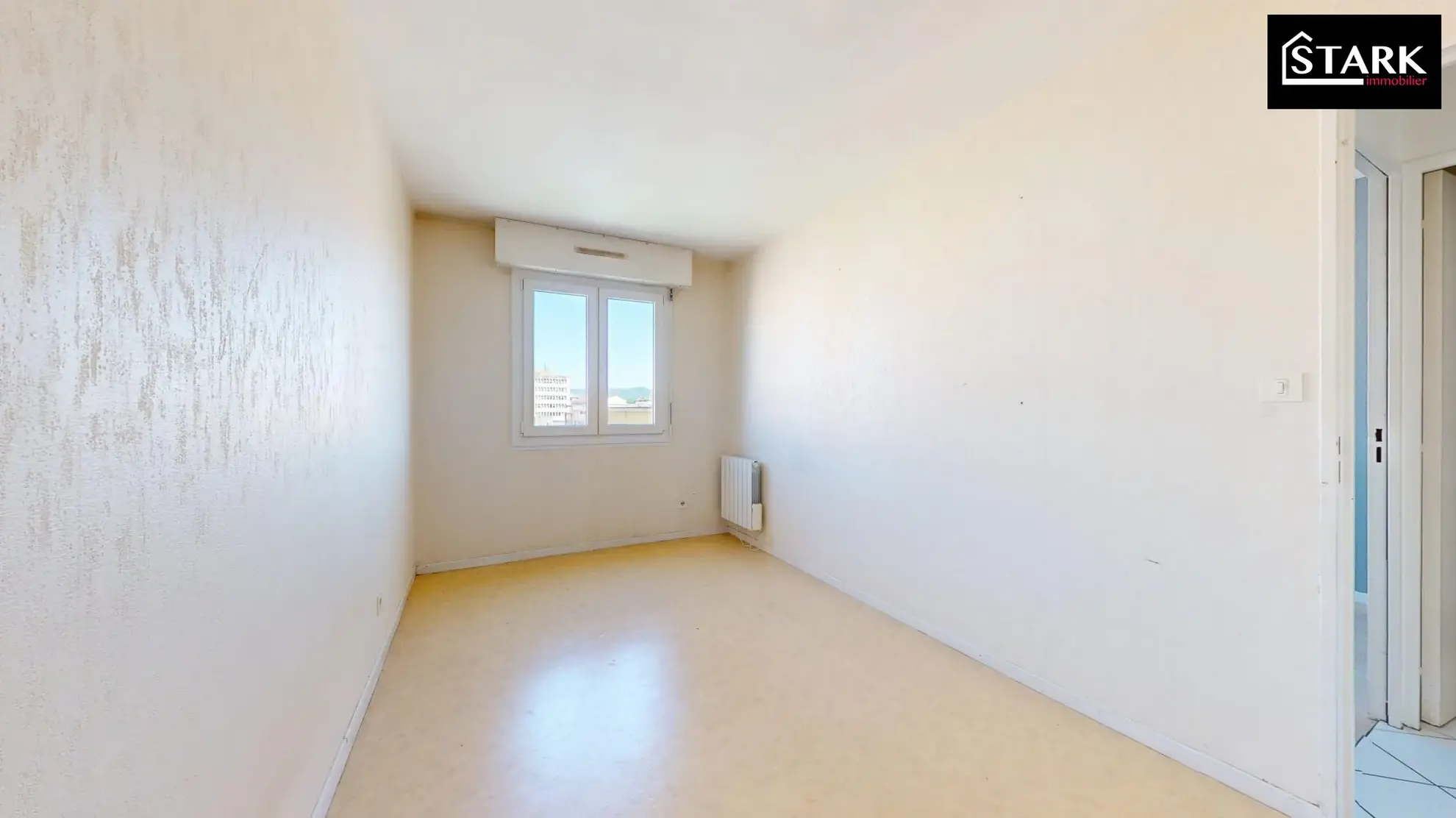 Appartement T4/T5 lumineux avec ascenseur, cave et parking au centre de Belfort 