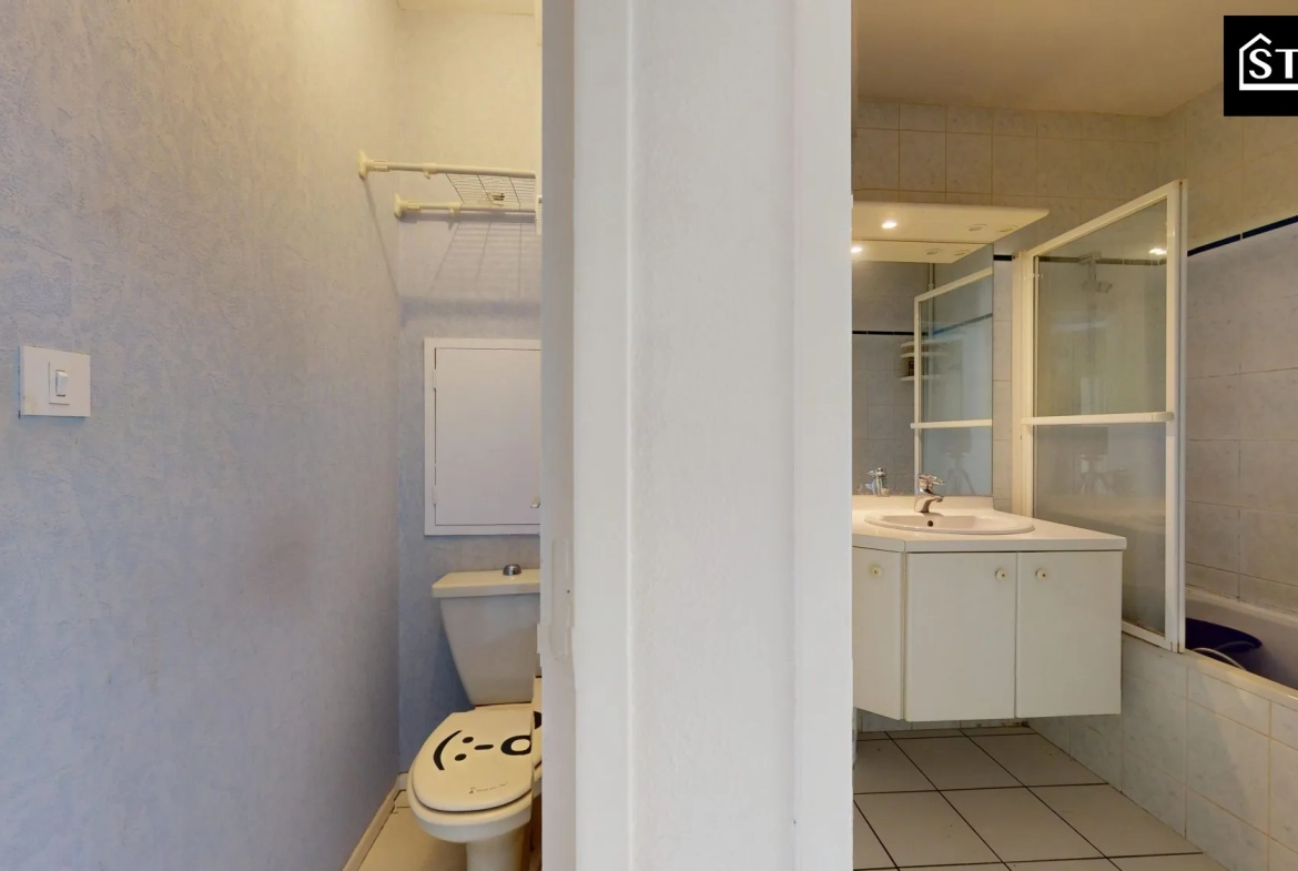 Appartement T4/T5 lumineux avec ascenseur, cave et parking au centre de Belfort 