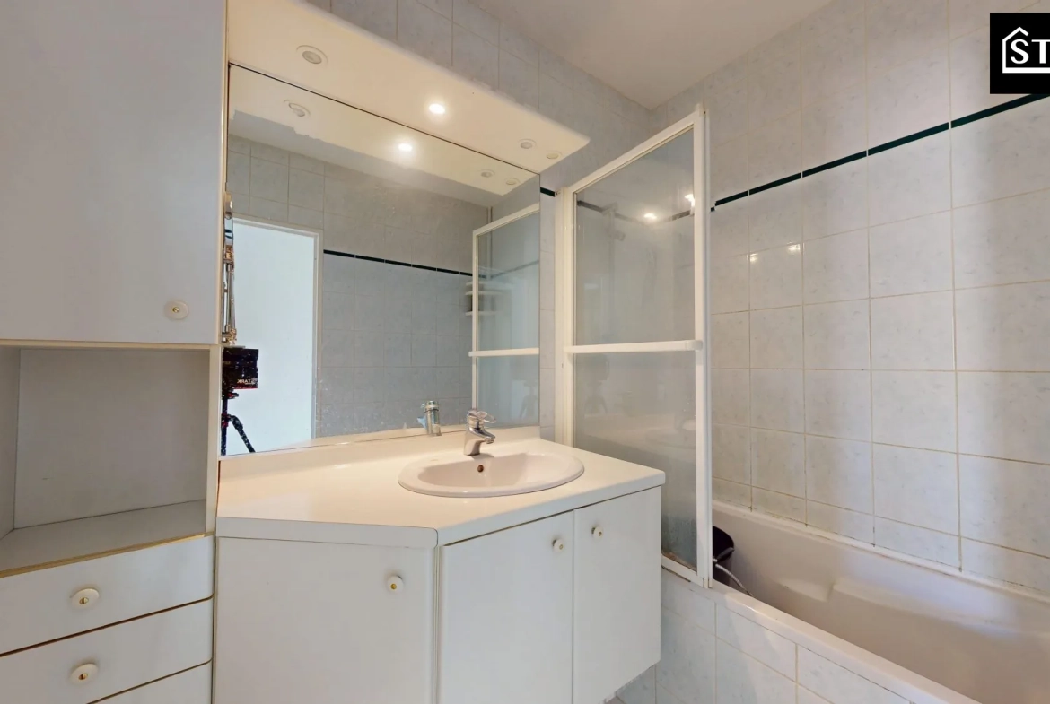 Appartement T4/T5 lumineux avec ascenseur, cave et parking au centre de Belfort 