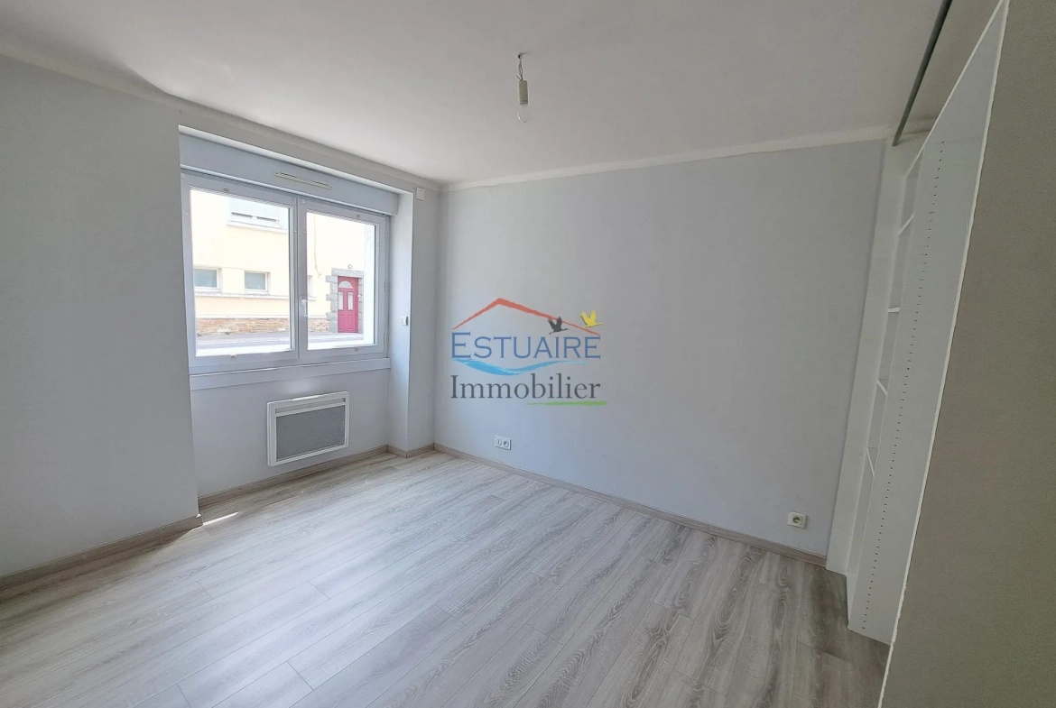 Investissement locatif à Casson avec deux logements et opportunités d'aménagement 