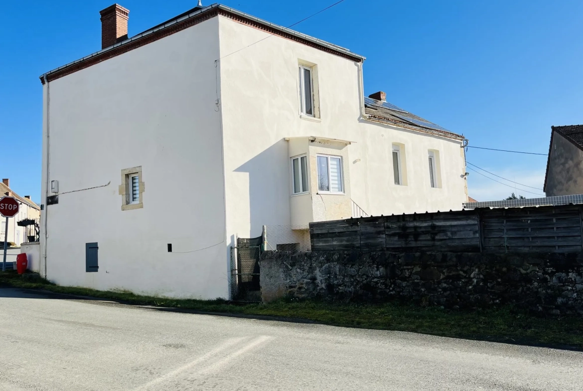 Opportunité maison familiale à Chamberat avec garage et jardin, proche Montluçon 