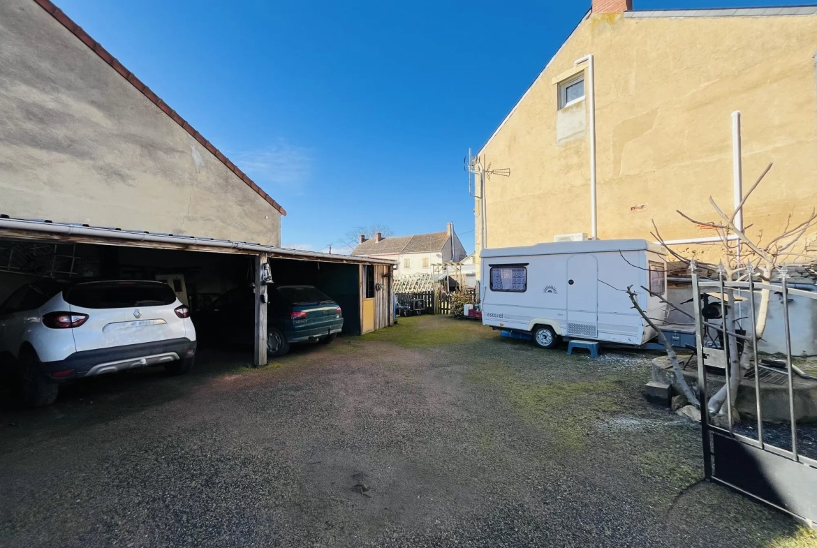 Opportunité maison familiale à Chamberat avec garage et jardin, proche Montluçon 