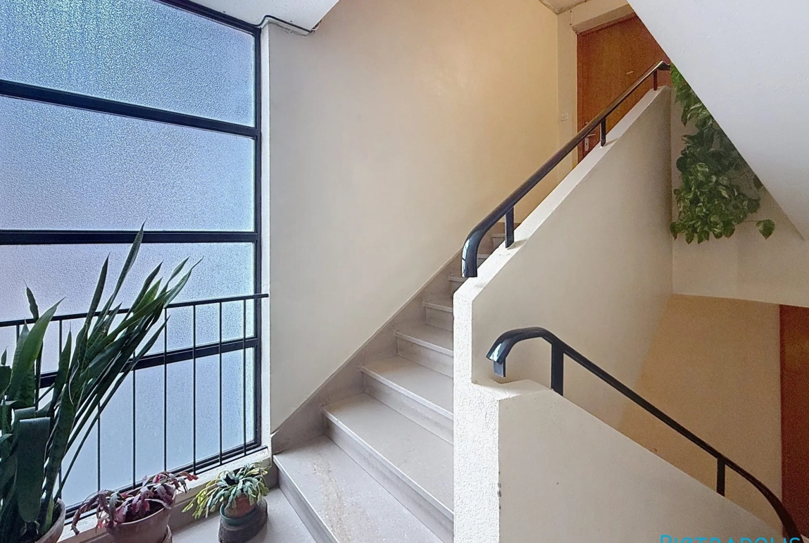 Vente appartement 4 pièces avec balcon à Roanne — proximité commerces et écoles 