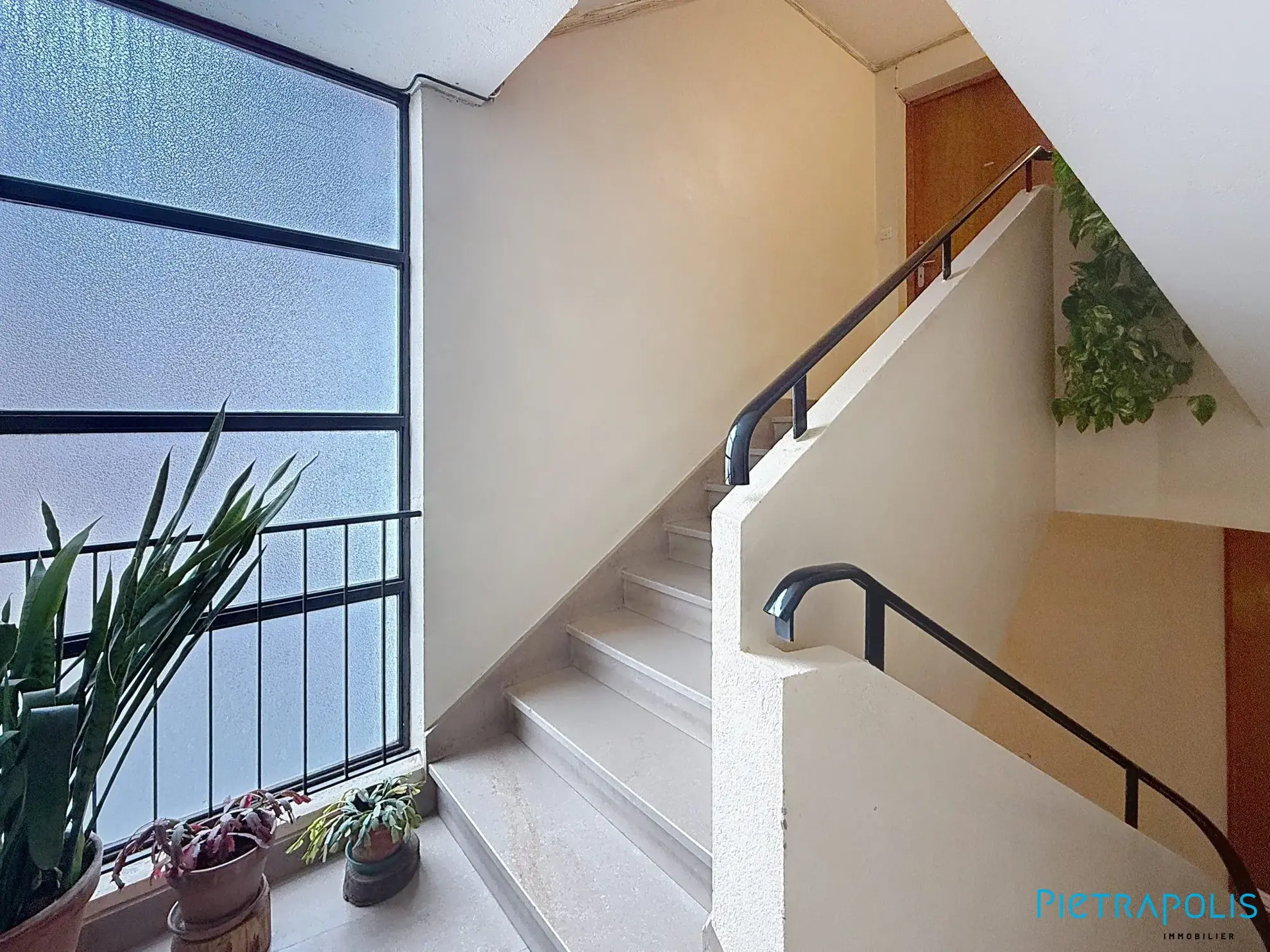 Vente appartement 4 pièces avec balcon à Roanne — proximité commerces et écoles 