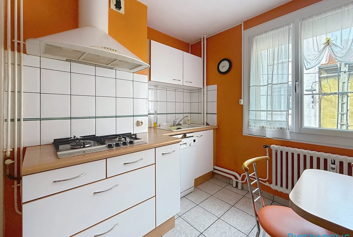 Vente appartement 4 pièces avec balcon à Roanne — proximité commerces et écoles 
