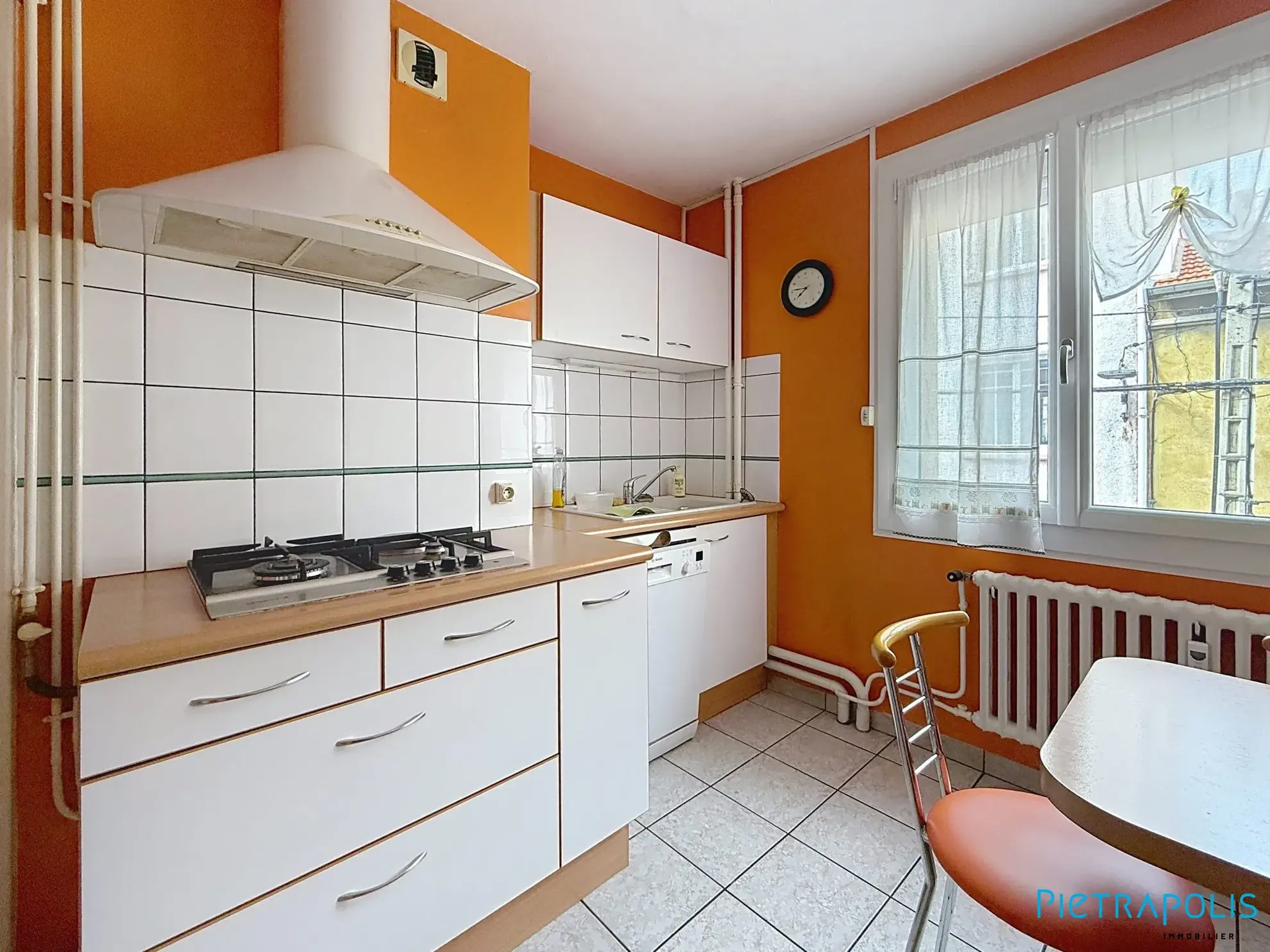 Vente appartement 4 pièces avec balcon à Roanne — proximité commerces et écoles 