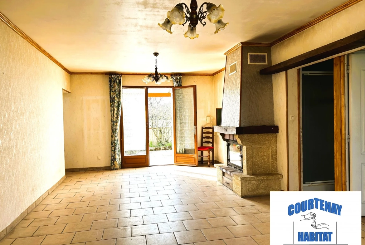 Pavillon à vendre à Jouy (89150) avec terrain de 1225 m² - 4 chambres, garage, et aménagements modernes 