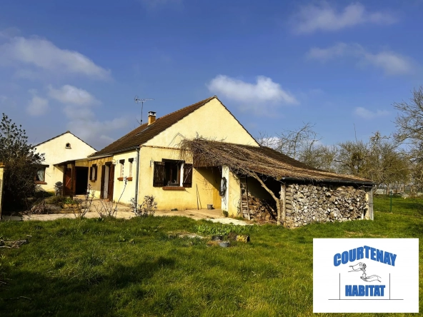 Pavillon à vendre à Jouy (89150) avec terrain de 1225 m² - 4 chambres, garage, et aménagements modernes
