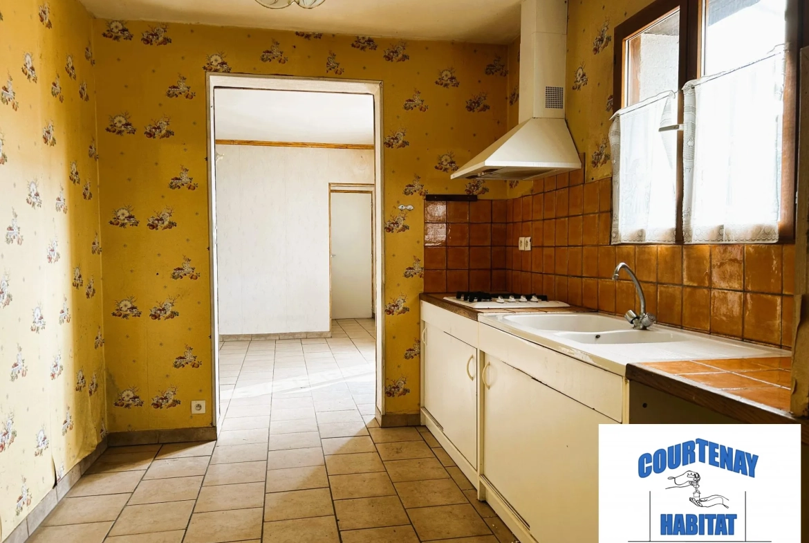 Pavillon à vendre à Jouy (89150) avec terrain de 1225 m² - 4 chambres, garage, et aménagements modernes 