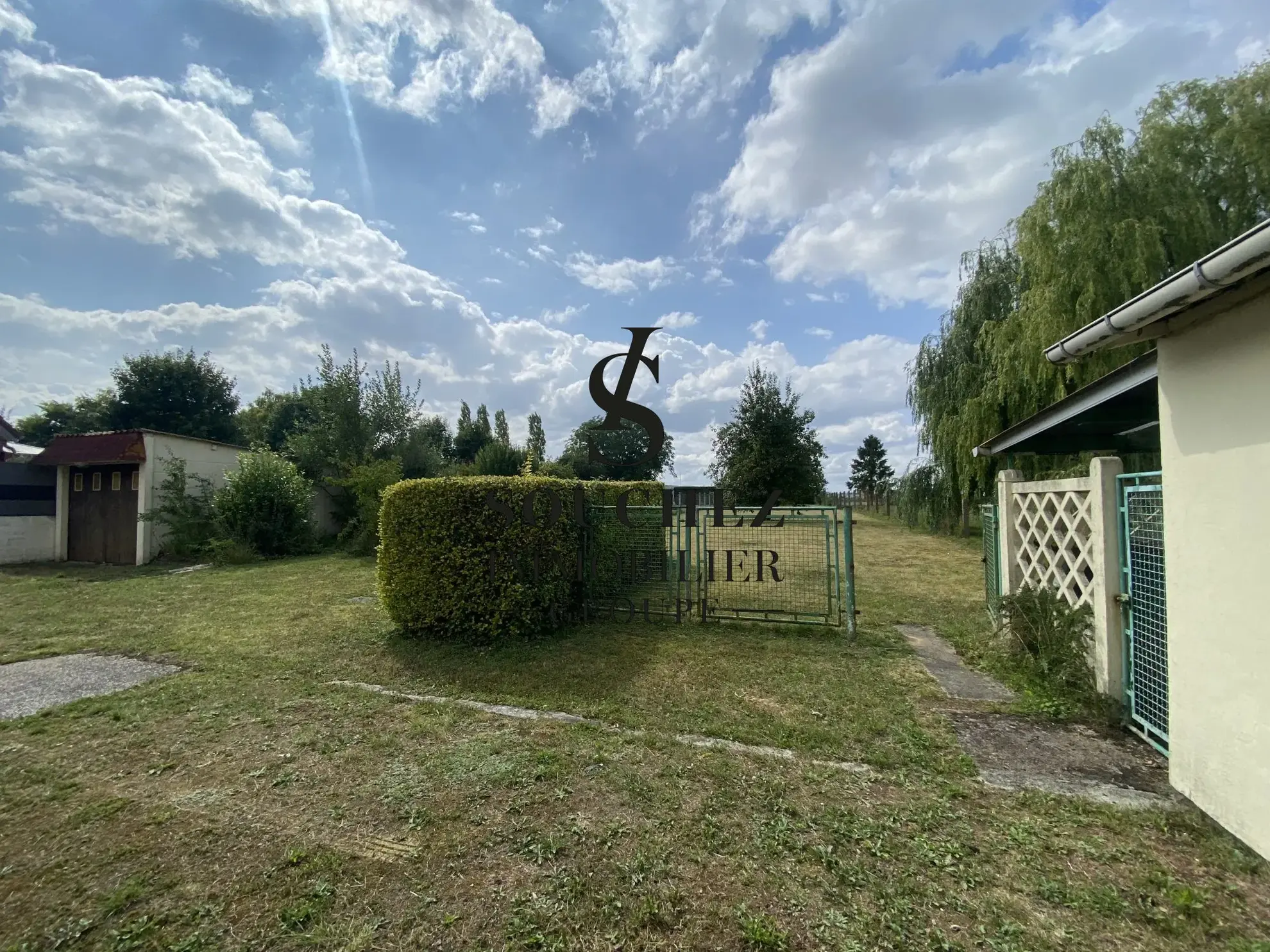 Maison individuelle à Angres de 92 m² avec grand jardin et potentiel de rénovation 