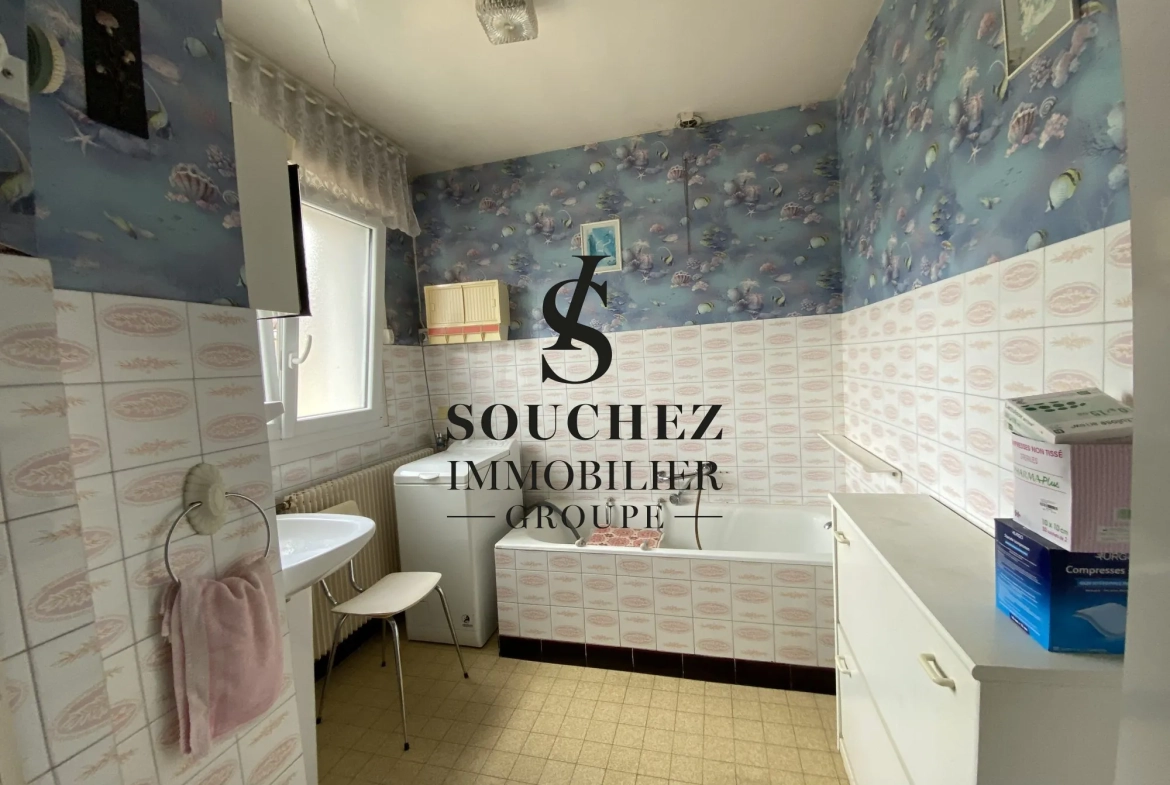 Maison individuelle à Angres de 92 m² avec grand jardin et potentiel de rénovation 