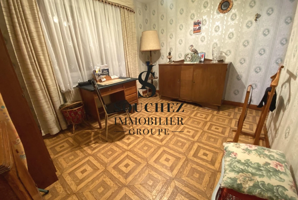 Maison individuelle à Angres de 92 m² avec grand jardin et potentiel de rénovation 