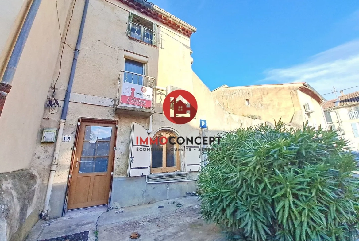 Maison à rénover à Roquemaure avec terrasse, balcon et potentiel d'investissement 