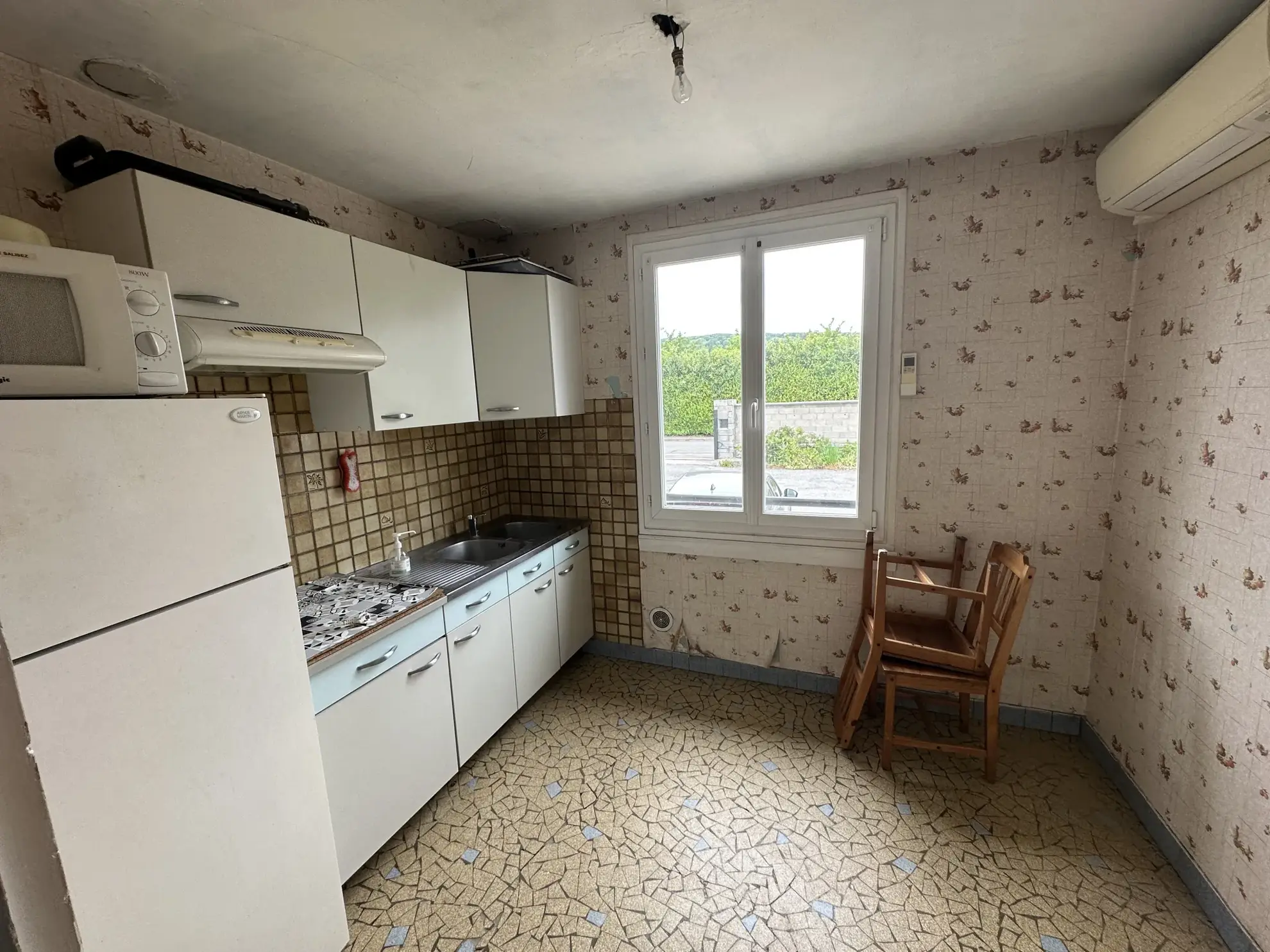 Maison à vendre à Gasny (27) avec grand terrain et potentiel d'agrandissement 