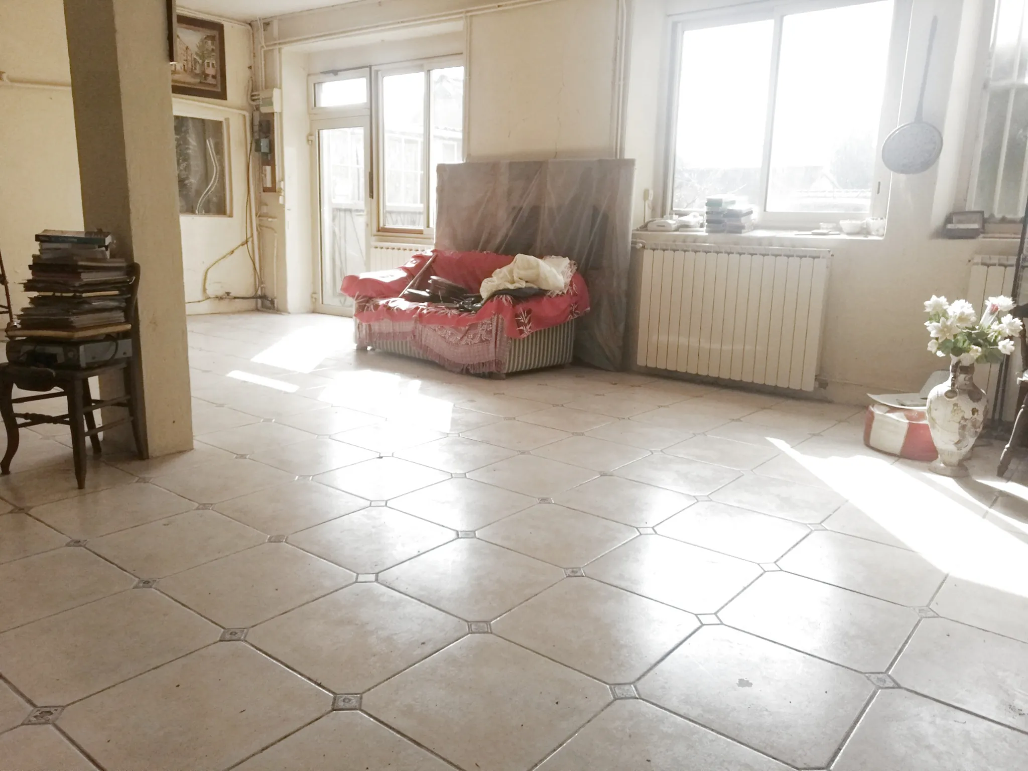 Charmante maison de ville à Nevers avec jardin, garage et travaux à prévoir 